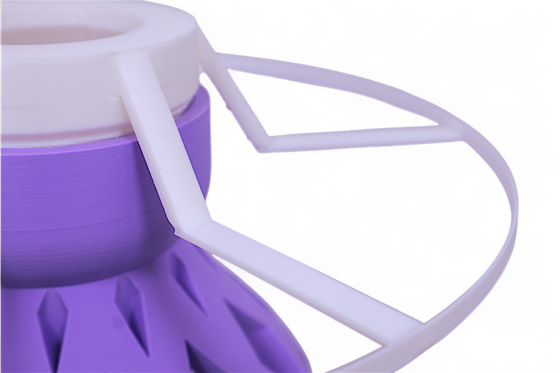 Close-up of a purple and white Lamp attachment on a white background