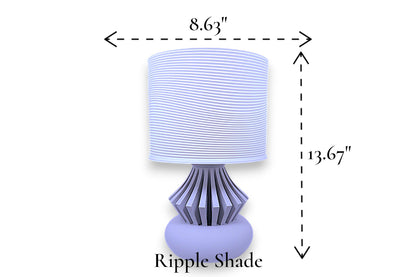 Table lamp – white ripple-textured cylindrical lampshade with sculptural slatted base, 8.63" diameter × 13.67" height, labeled “Ripple Shade”
