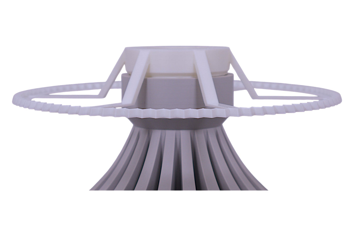 White plastic component on a white background