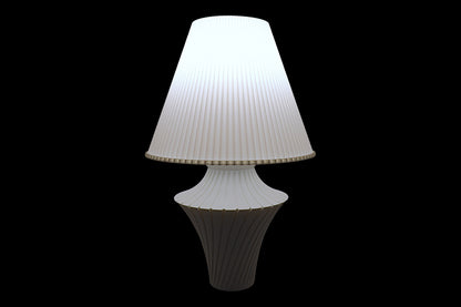 Lamp with a white pleated shade on a black background