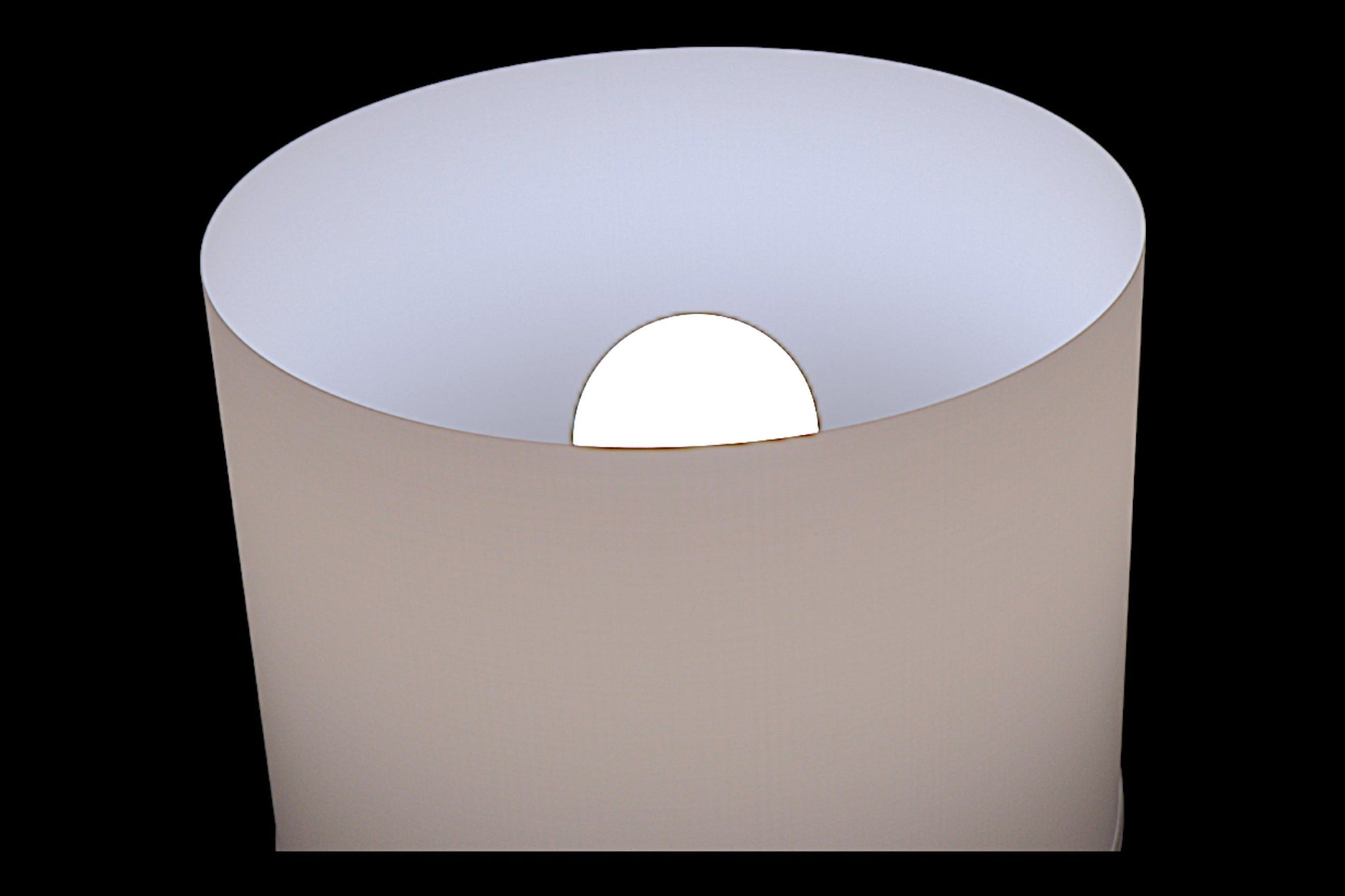 Modern wall-mounted light fixture with a white circular shade on a black background