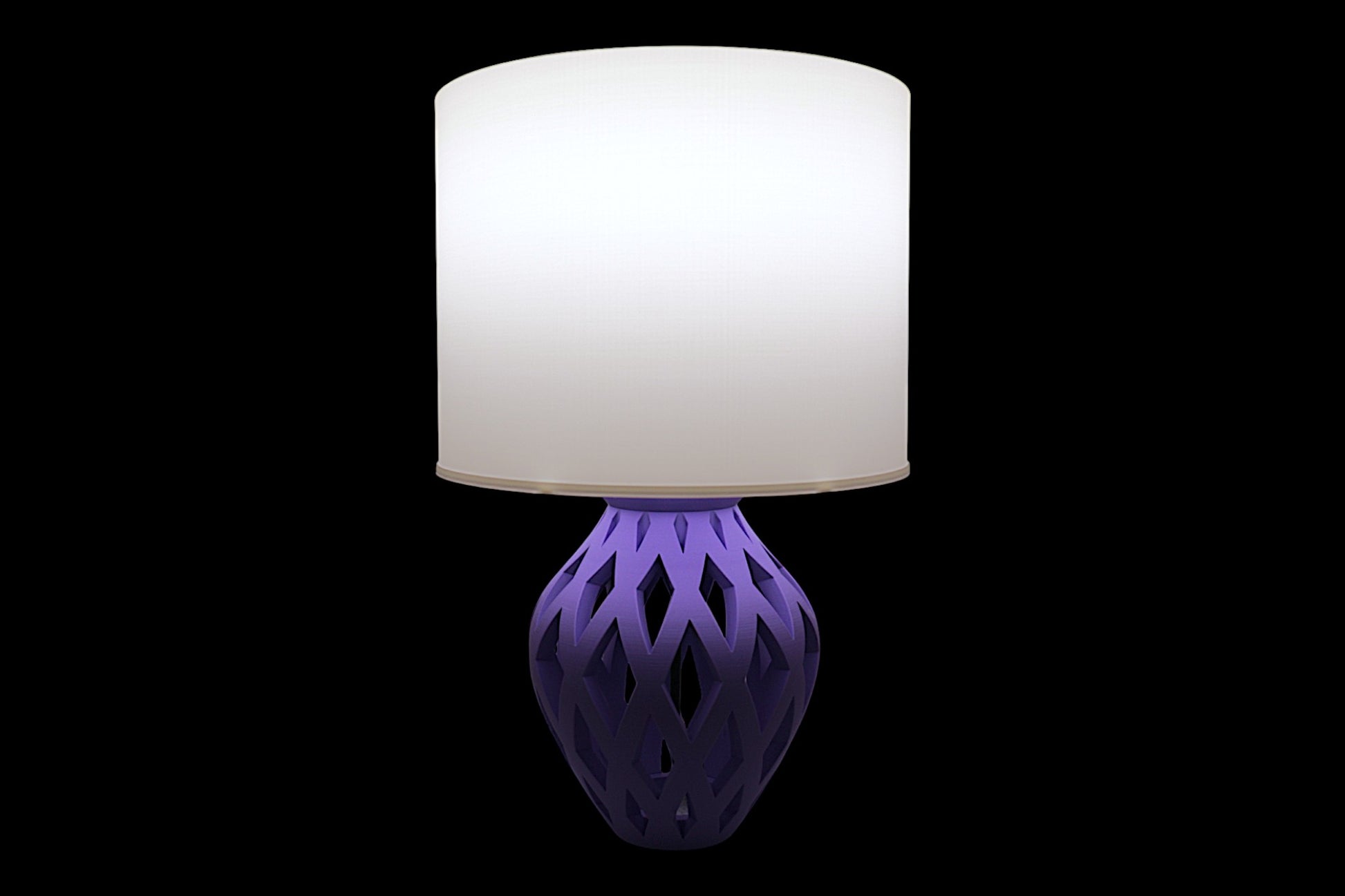 Lamp with a purple base and white shade on a black background