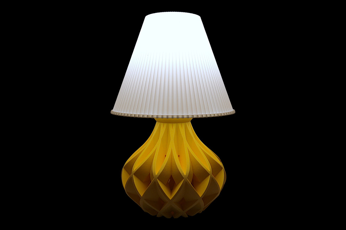 Table lamp – white pleated lampshade with sculptural yellow lattice-style base, labeled “Vima Shade”
