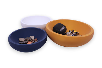 Catch-all trays – 3-pack set in white, navy blue, and mustard yellow PLA, round shape, shown with coins, keys, and small items
