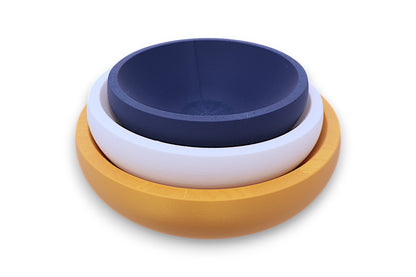 Catch-all trays – 3-pack set in mustard yellow, white, and navy blue PLA, nested round shape, shown on white background