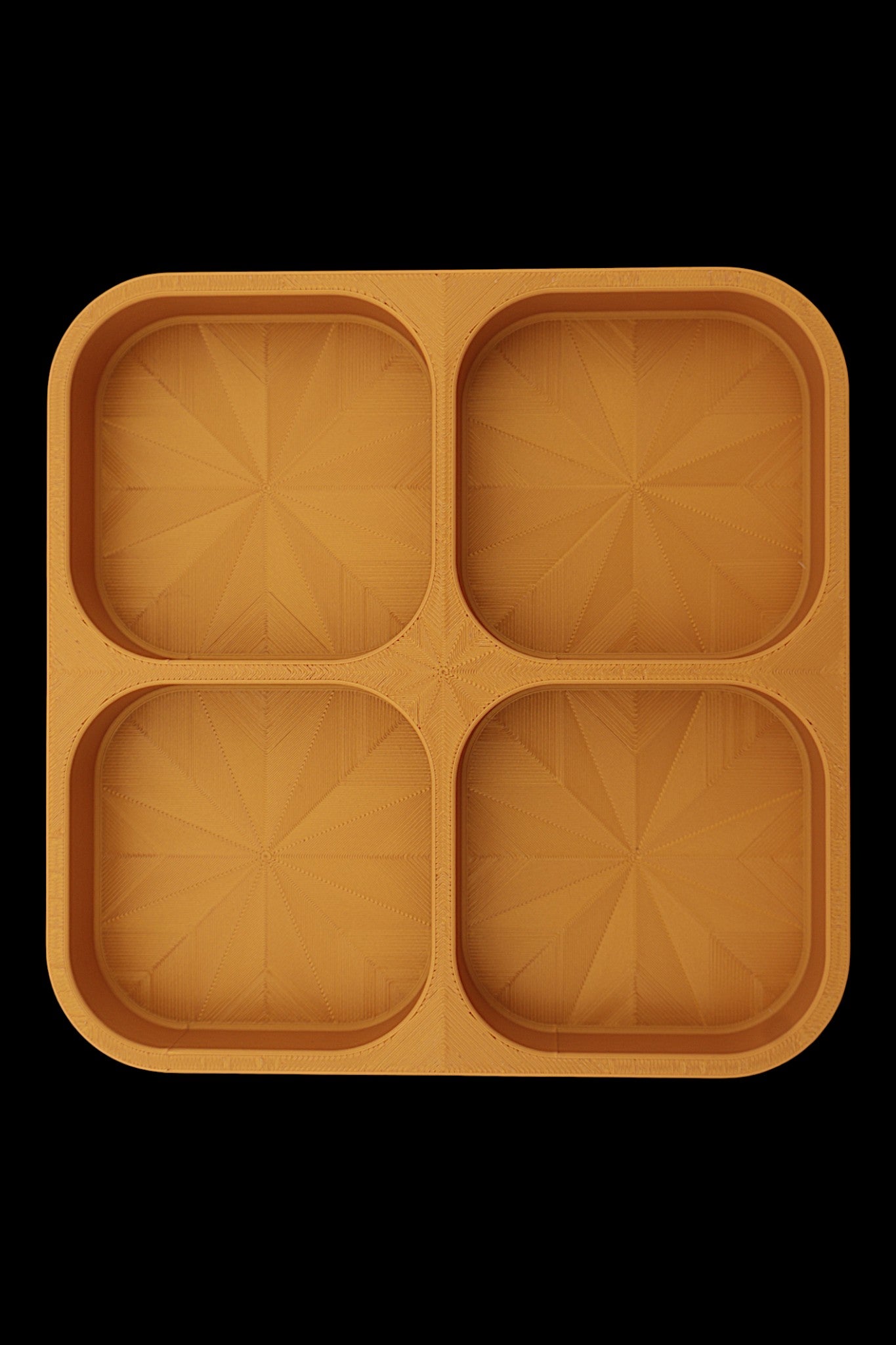 Catch-all tray – 3D printed in Gold PLA with four square compartments and starburst base pattern, shown empty
