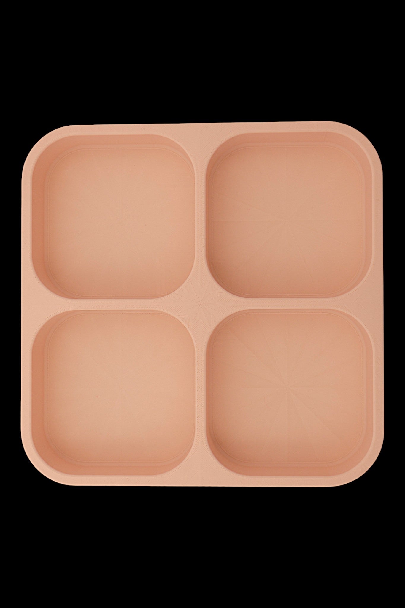 Catch-all tray – 3D printed in beige PLA with four square compartments and starburst base pattern, shown empty