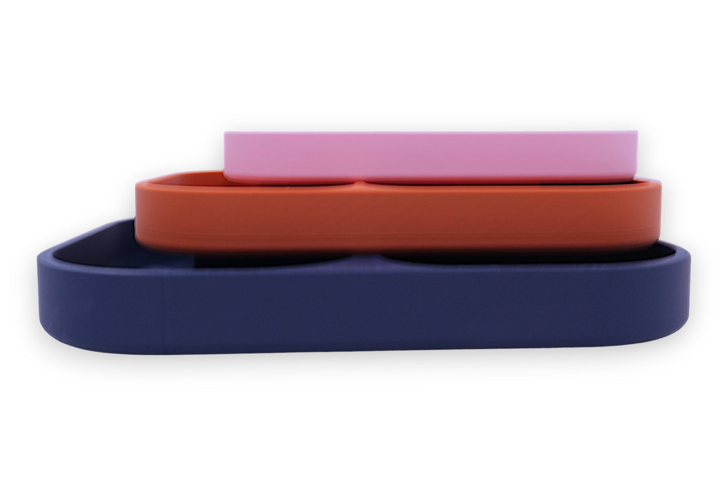 Divided plates – 3-pack set in pink, terracotta, and dark blue silicone, stacked with rounded corners and raised edges