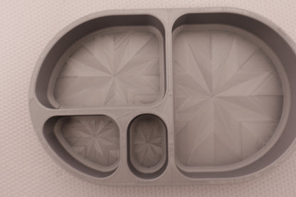 Compartment tray – silver PLA with four sections, geometric starburst pattern, shown empty
