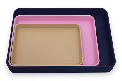 Catch-all trays – 3-pack set in dark blue, pink, and beige PLA, nested for size comparison

