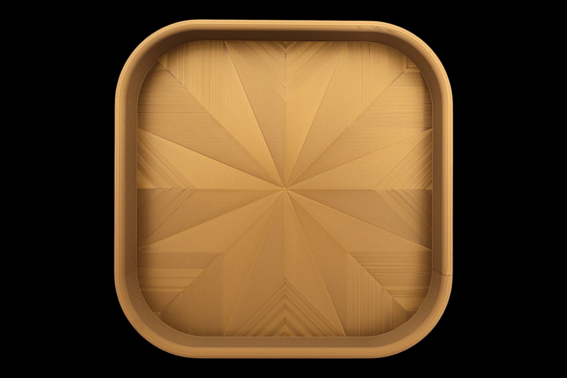 Catch-all tray – 3D printed in bronze PLA with square shape and starburst base pattern, shown empty
