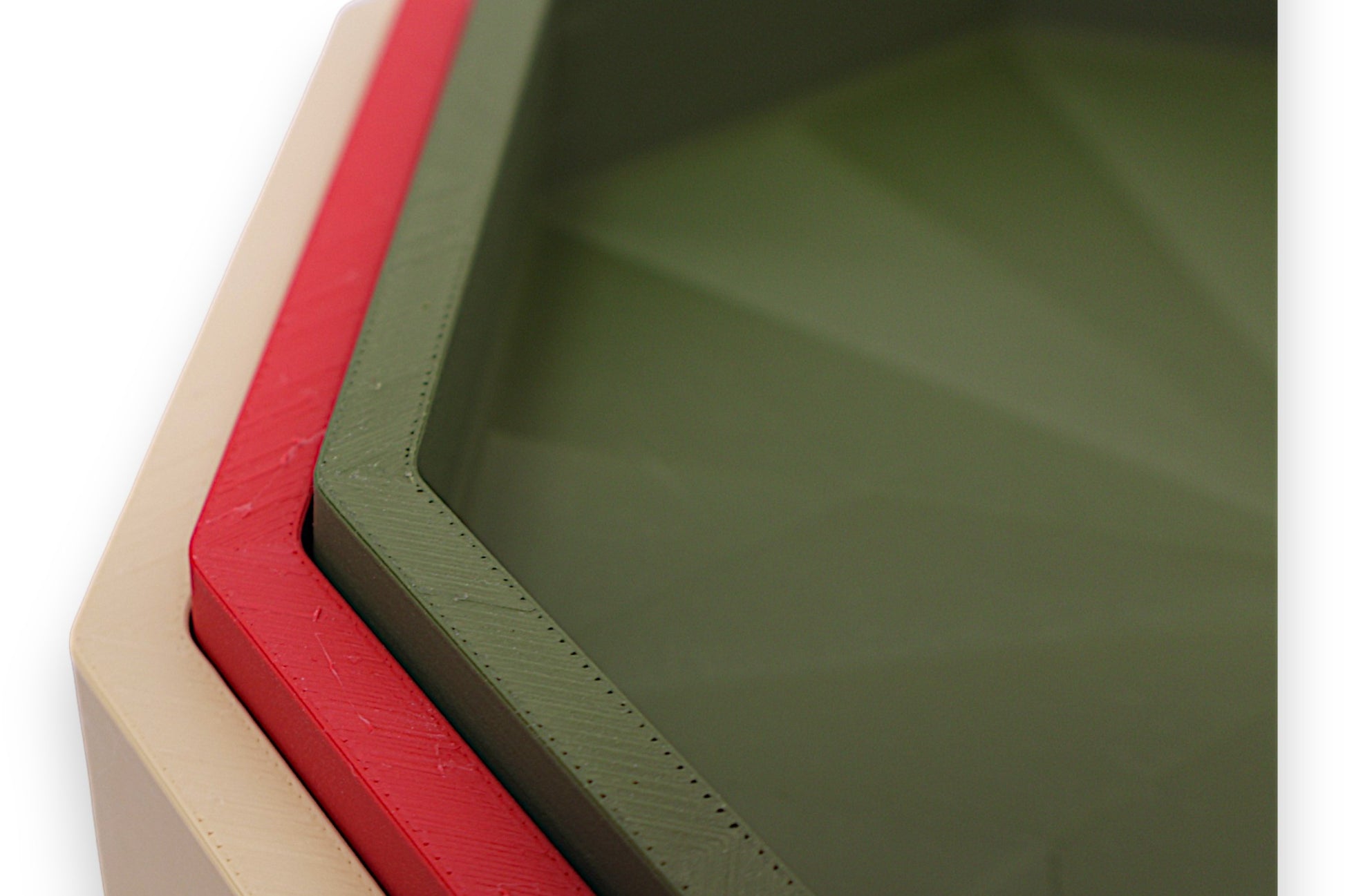 Catch-all trays – 3-pack set in white, red, and green PLA, nested octagonal shape with faceted base pattern
