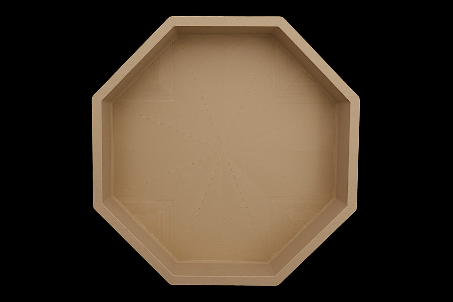 Catch-all tray – 3D printed in Tan PLA with octagonal shape and radial base pattern, shown empty
