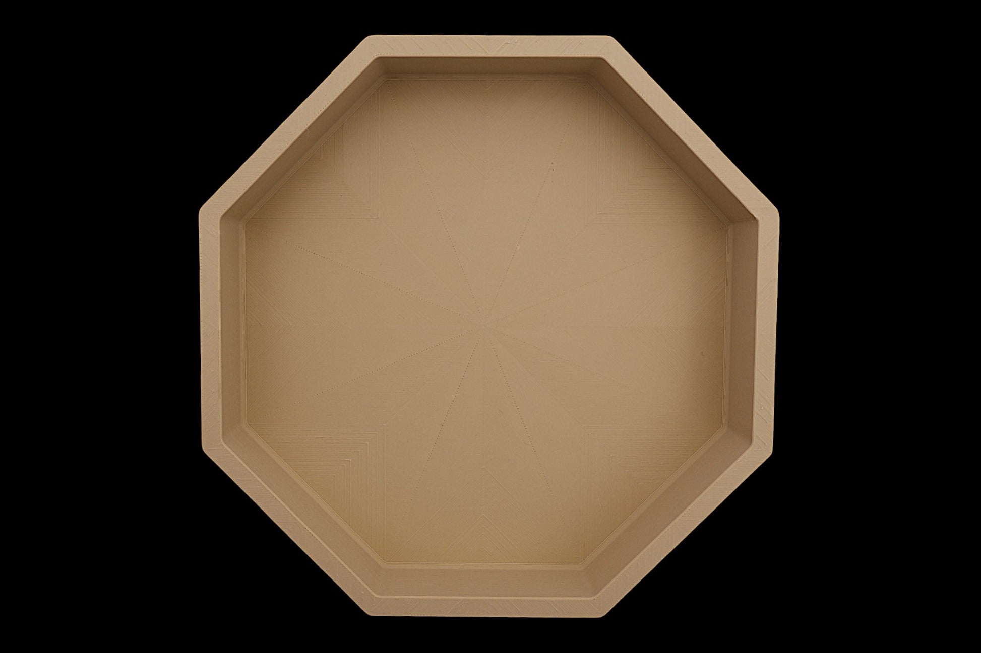 Catch-all tray – 3D printed in Tan PLA with octagonal shape and radial base pattern, shown empty
