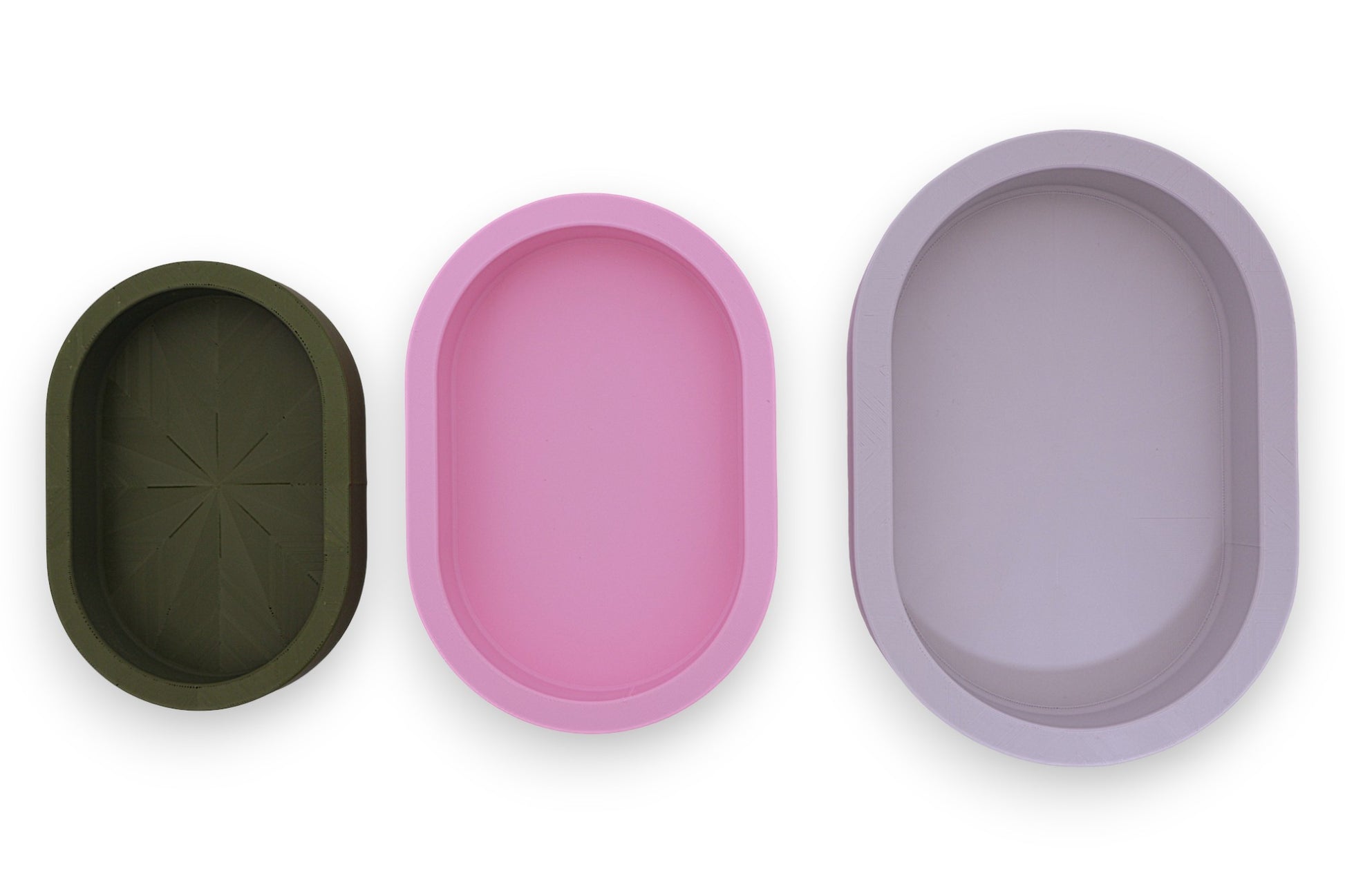Catch-all trays – 3-pack set in green, pink, and white PLA, oval shape with smooth interiors, shown empty
