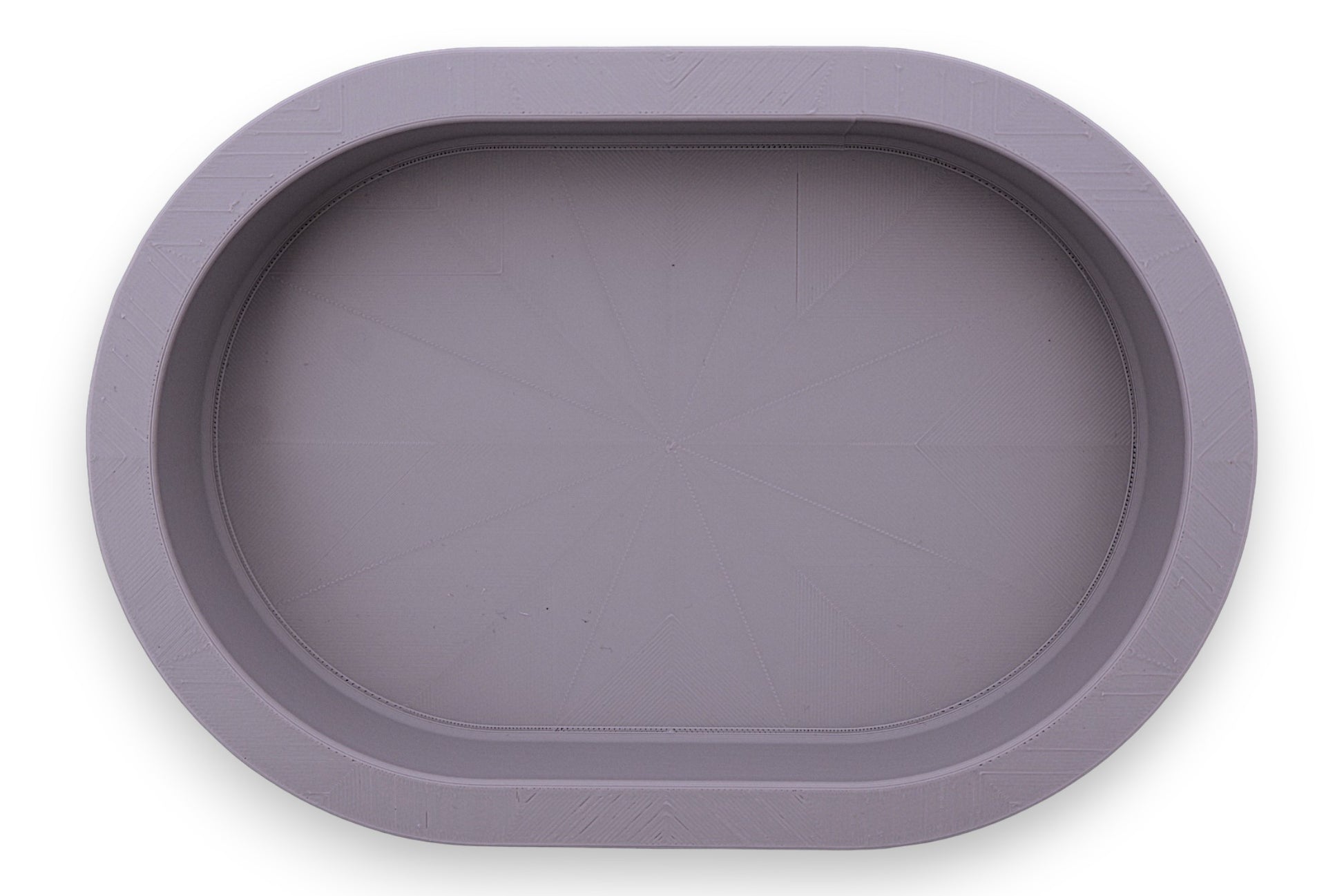 Catch-all tray – 3D printed in silver PLA with oval shape and subtle radial base pattern, shown empty
