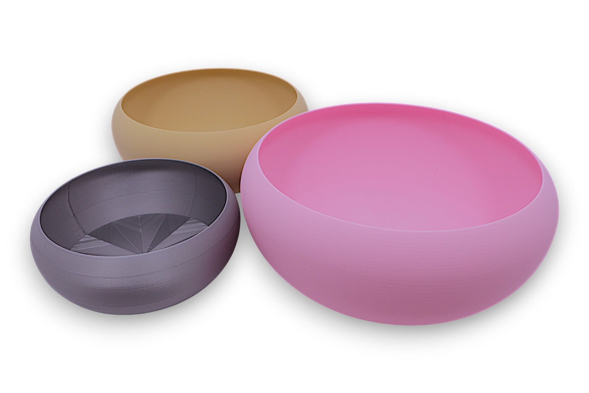 Catch-all trays – 3-pack set in pink, tan, and smooth gray PLA, stacked in triangular layout
