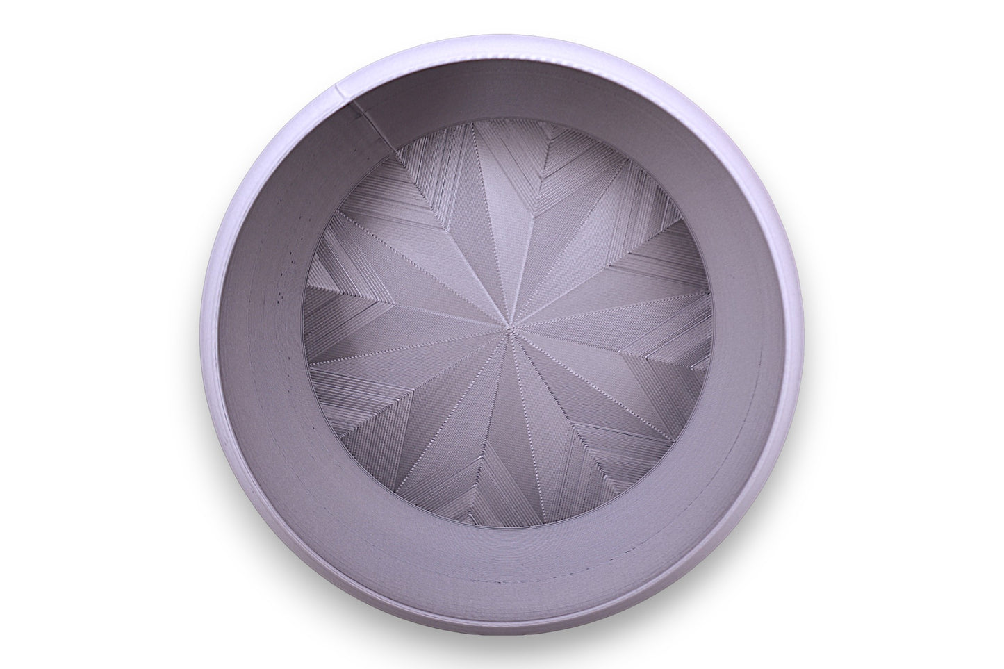 Catch-all tray – top-down view of gray PLA tray with geometric mesh base, starburst pattern
