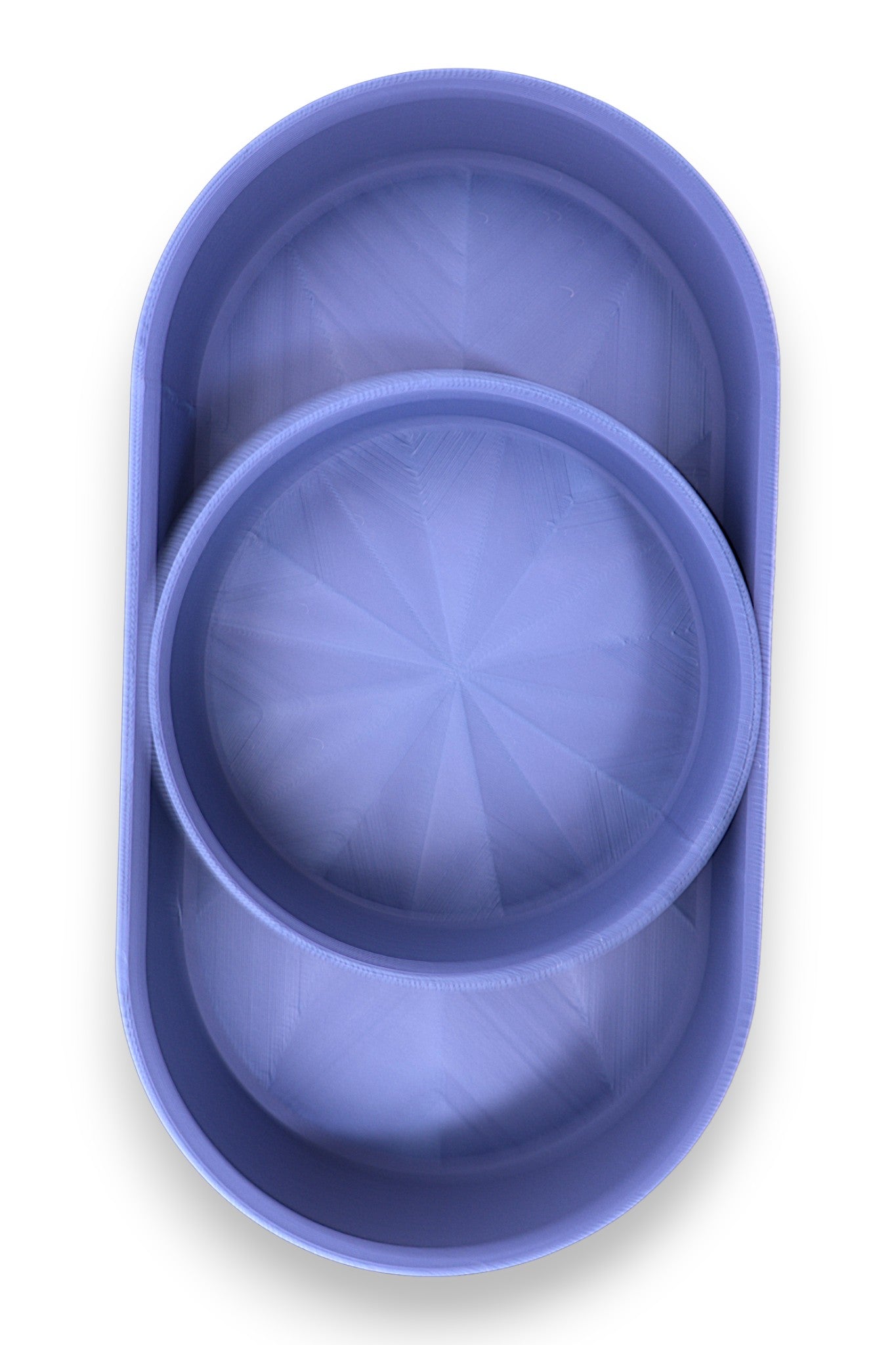 Catch-all trays –  set in navy blue PLA, one oval and one round tray with starburst base pattern
