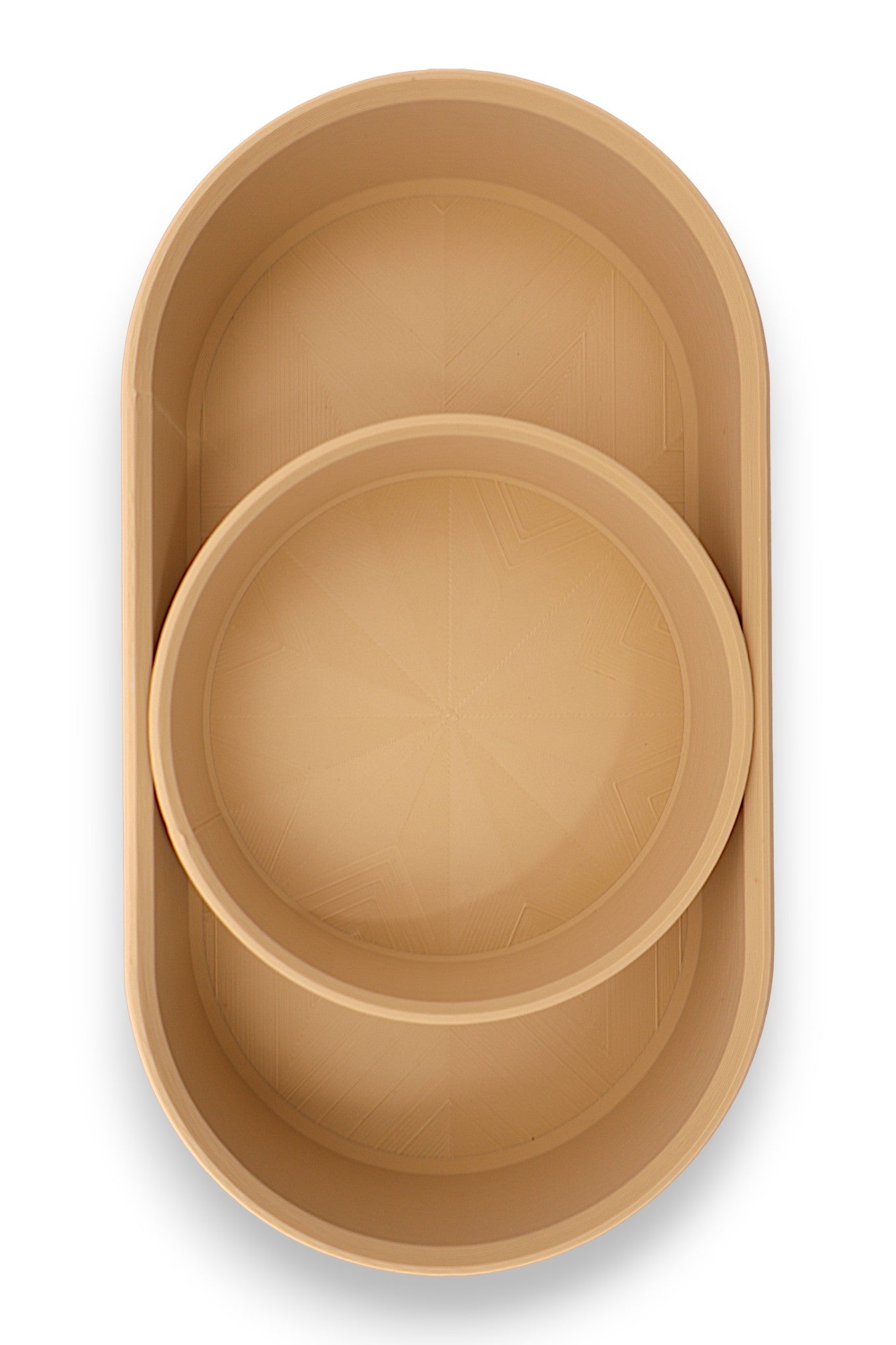 Catch-all tray – 3D printed in tan PLA with oval shape and starburst base pattern, shown empty
