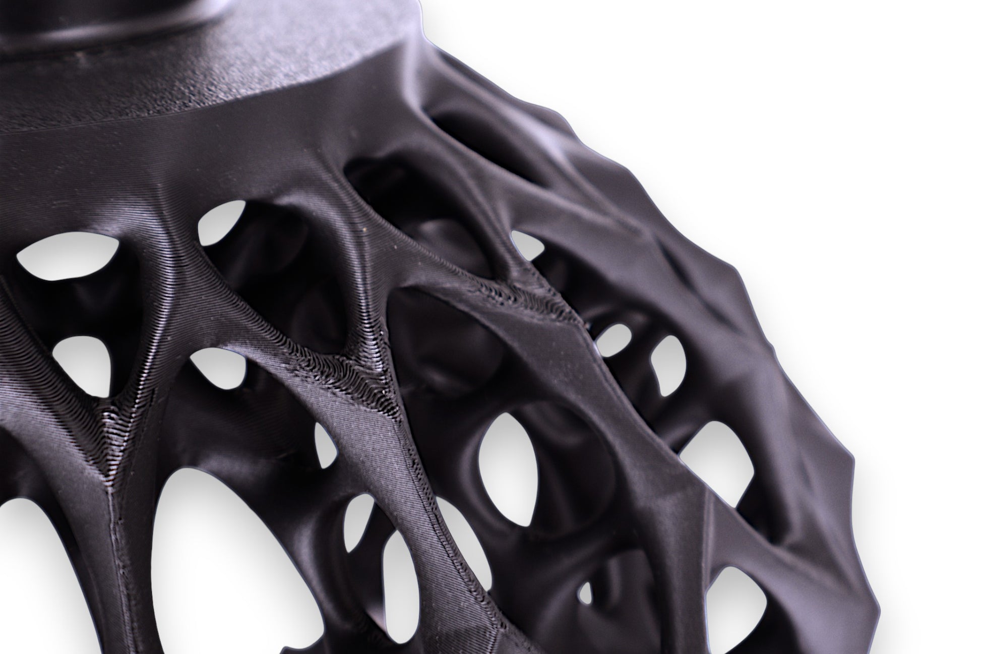 Hanging pendant light with elongated oval cutouts and soft interior glow