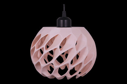 Pink pendant light with a unique geometric design on a black background