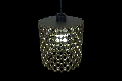 Modern pendant light with geometric design on a black background