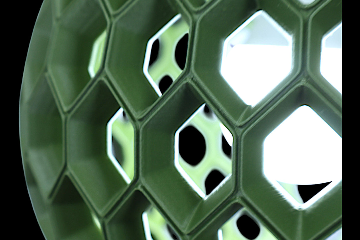 Close-up of a green honeycomb-like structure
