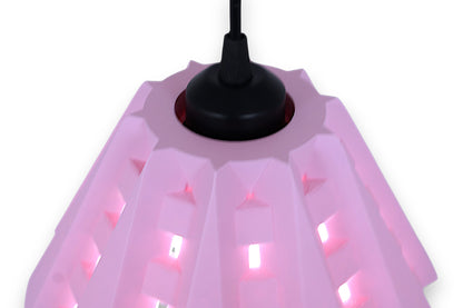 Pendant lamp – 3D printed in pink PLA with angular shell and rectangular cutouts, glowing bulb visible inside
