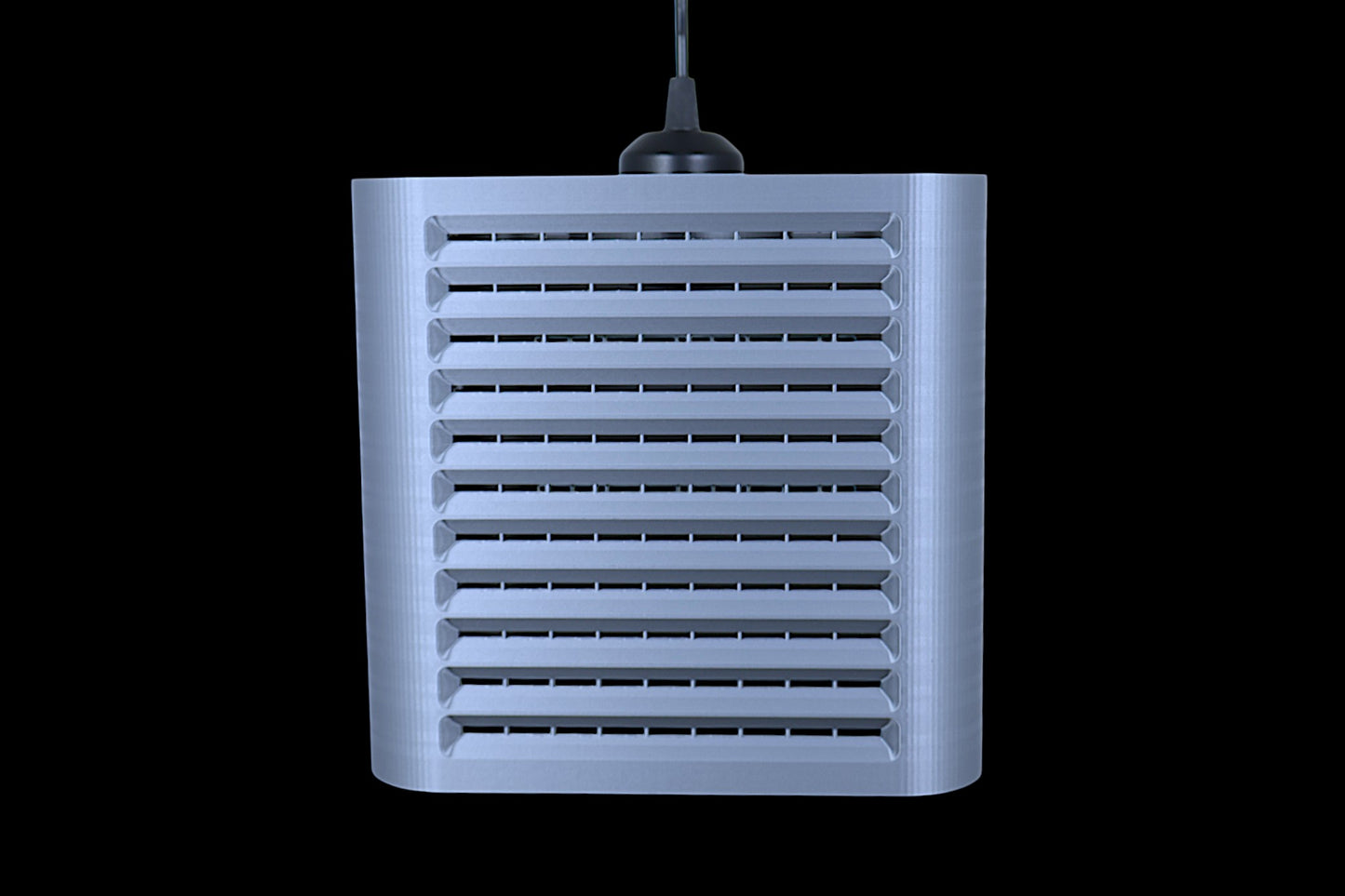 Coro pendant lamp – 3D printed with rectangular housing and angled horizontal slats, suspended by black cable