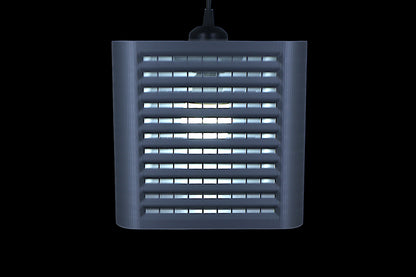 Coro pendant lamp – 3D printed with cube-shaped housing and horizontal slats, internal bulb emits soft white glow
