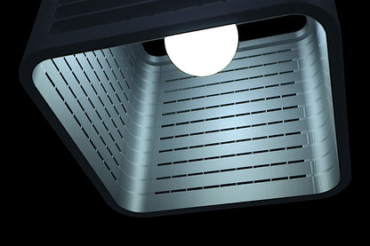 Coro pendant lamp – 3D printed with rectangular silver housing, front slats and grid-textured top, suspended by black cable