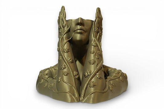 “3D‑printed gold sculpture of a human bust with ornate, vine‑wrapped hands rising from the shoulders and partially covering the face.”