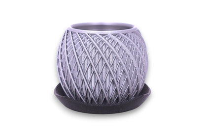 Silver PLA planter – 3D printed with spiral interwoven texture, placed on matching base
