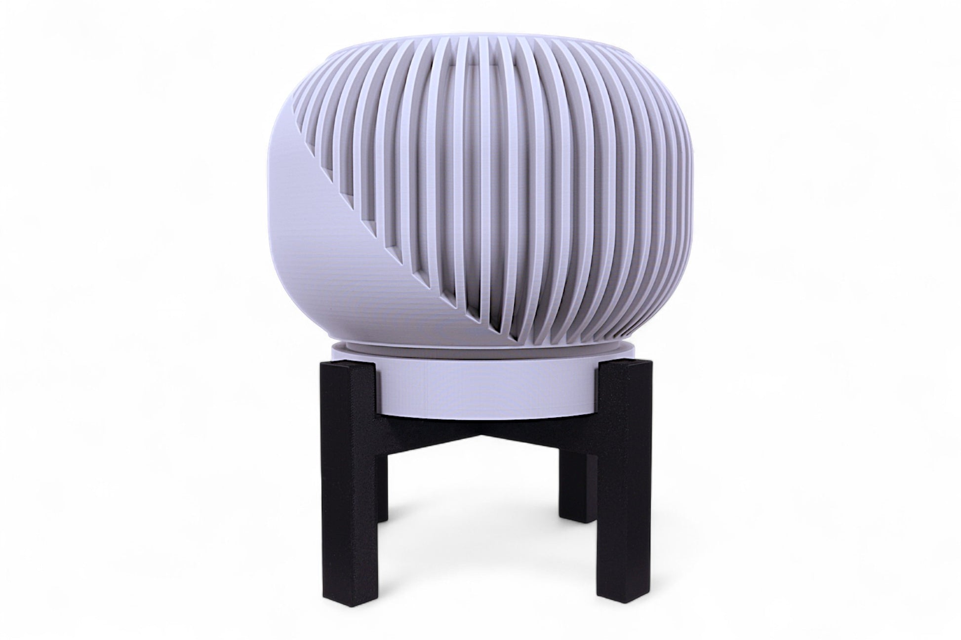 Gray planter with vertical slats next to black stand with horizontal supports